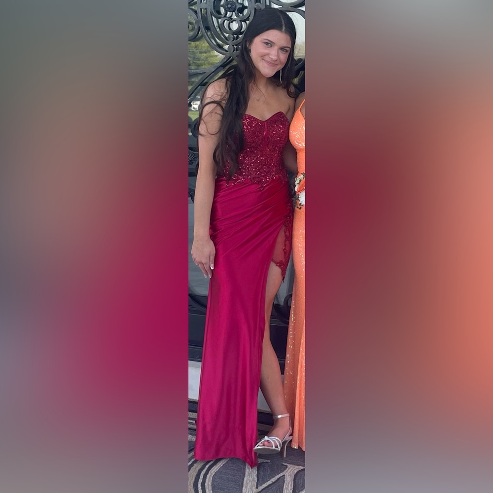 Beautiful red corseted prom dress with sequins & ribbed detailing.